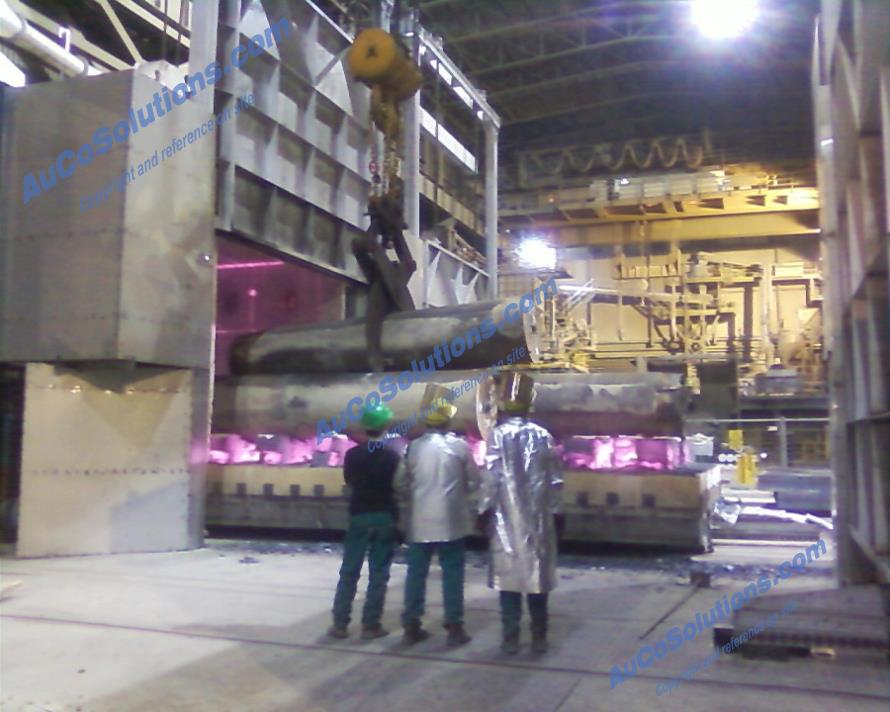 Metal heat treating VERONA STEEL: placing 150 ton of iron inside the oven (Verona - Italy)